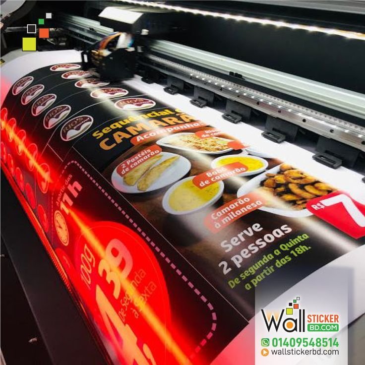 Large format digital printing machine in operation at Print Fever